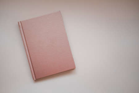 Closed notebooks copper color. Top viewの写真素材