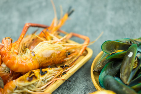 Thai seafood - grilled prawn and boiled musselsの写真素材
