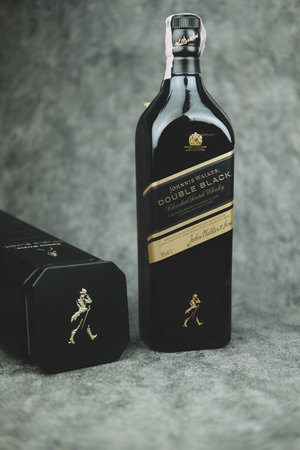 Bangkok, Thailand - November 30, 2021 : Bottle of Johnnie Walker Double Black, the most widely distributed brand of blended Scotch whisky in the world with sales of over 130 million bottles a year.のeditorial素材
