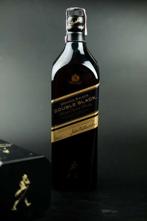 Bangkok, Thailand - November 30, 2021 : Johnnie Walker Double Black Whisky 1ltr. The most widely distributed brand of blended Scotch whisky in the world with sales of over 130 million bottles a year.のeditorial素材