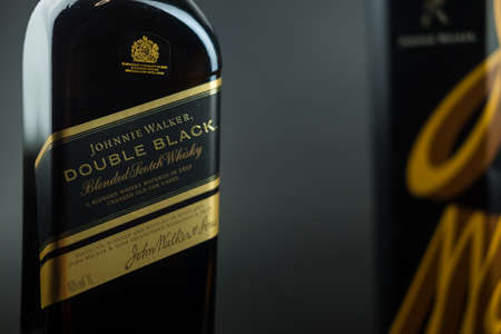 Bangkok, Thailand - November 30, 2021 : Illustrative editorial image of a bottle of Johnnie Walker Double Black on a black backgroundのeditorial素材