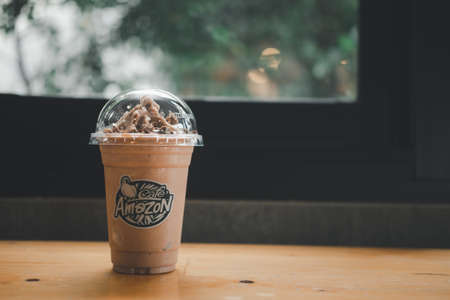 Bangkok, Thailand - December 15, 2021 : The new menu Caramel Mocha Frappe with KitKat has priced 70 baths at all Cafe Amazon branches. Cafe Amazon beverage shop at PTT oil station.のeditorial素材