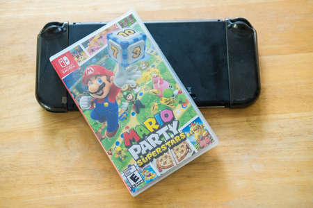 Bangkok, Thailand - December 27, 2021 : The new game cartridge of the Nintendo Switch video game...