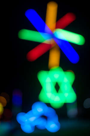 Fluorescent light colorful in dark for festival temple fair background.