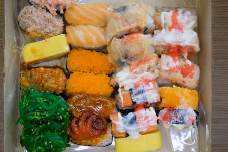 Various kinds of classic Japanese sushi set in the paper box. Healthy and delicious food.の写真素材