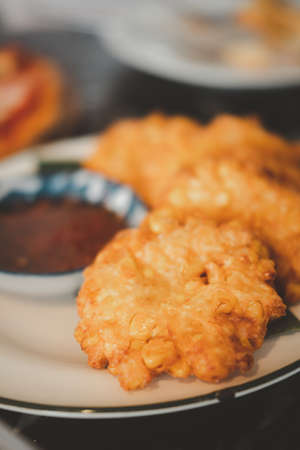 Sweet corn fritters or deep fried corn cake. Selective focusの写真素材