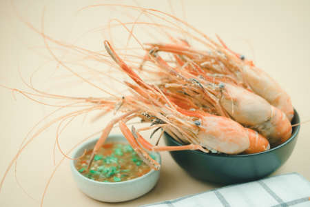Boiled shrimp in bowl with spicy sauce. Thai homemade foodの写真素材