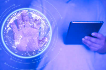 Businessman palm touching global network and data changes over the world. global network and data exchanges conceptの写真素材