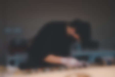 Blur background of chef wearing mask preparing Japanese food in a Japanese restaurant.の写真素材