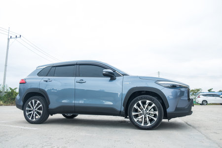 Samut Prakan, Thailand - April 2, 2022 : All-new Toyota Corolla Cross car with 1.8-liter hybrid engine. The latest Toyota's SUV. Hybrid engine 4th generation.のeditorial素材