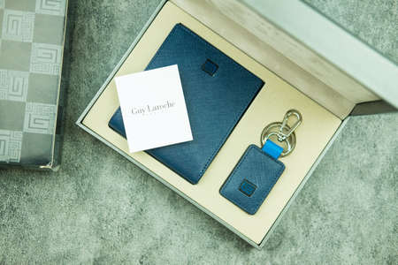 Samut Prakan, Thailand - May 14, 2022 : Men blue wallet from Guy Laroche in box