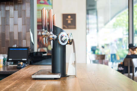 Samut Prakan, Thailand - May 29, 2022 : The Nitro Cold Brew machine tap at Starbucks coffee shop, Taps of nitro coffee at coffee barのeditorial素材