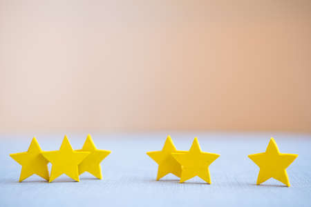 Wood yellow star shape three group, one, two and three star. Customers choose ratings for user...