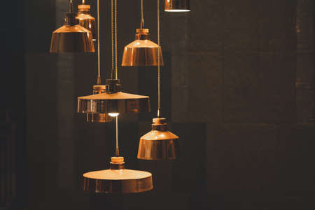 Copper lamp hanging dining lights with fluorescent bulbsの写真素材