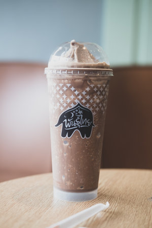 Samut Prakan, Thailand - July 2, 2022 : Cafe Punthai coffee is a famous coffee company in Thailand. Blended iced mocha coffee in plastic glassのeditorial素材