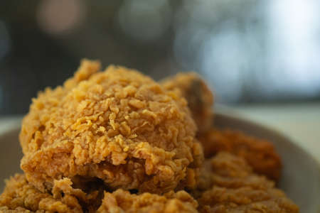 Crispy fried chicken against blur background. Selective focusの写真素材