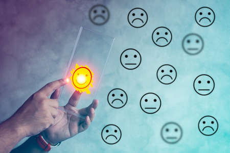 Customer service experience and business satisfaction survey. Customer selecting icon to give satisfaction in service. rating very impressed.の写真素材