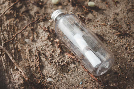 A Letter or lovely message in bottle at the coastの写真素材