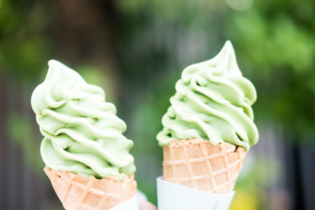 Two soft serve ice cream cone with premium matcha green tea. Close up