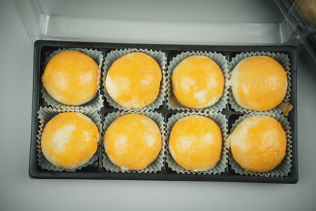 Thai dessert and Traditional Chinese dessert sweet filling with salted egg arrange in box for saleの写真素材