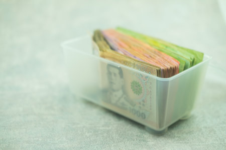 Thai Baht banknote in box. business, money, investment, finance, and payment conceptsの写真素材