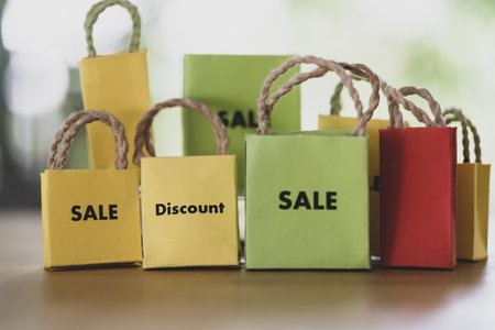Miniature paper shopping bags for advertisement and retai. Shopping season conceptの写真素材