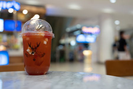 BANGKOK, THAILAND - OCTOBER 30, 22 : The Alley drink, Super Honey Fruit Party, premium grade Oolong...