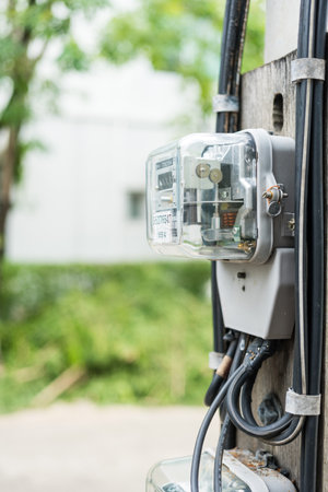 Samut Prakan, Thailand - November 15, 2022 : Electricity measuring device meter of the house. The...