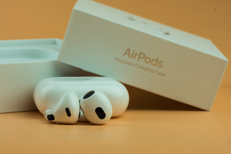 Bangkok, Thailand - December 10, 2022 : Apple AirPods 3 with case and open packaging.