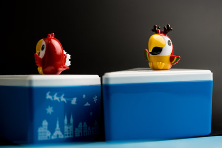 Bangkok, Thailand - December 14, 2022 : Blue cut box with white lid and bird mascot from Cafe Amazon. Souvenir gets free for a customer two drink order at cafe amazon.のeditorial素材