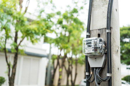 Samut Prakan, Thailand - December 17, 2022 : Electric meter with copy space. This meter measure how much the house owner should much pay bills per monthのeditorial素材