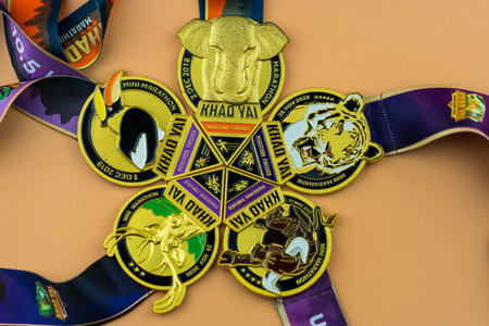 Nakhon Ratchasima, Thailand - December 17, 2022 : Medal is given to finisher in Khaoyai Marathon of the mini-marathon 10.5k, It is runner event in Khao Yai and has been held continuously for 5 years.のeditorial素材
