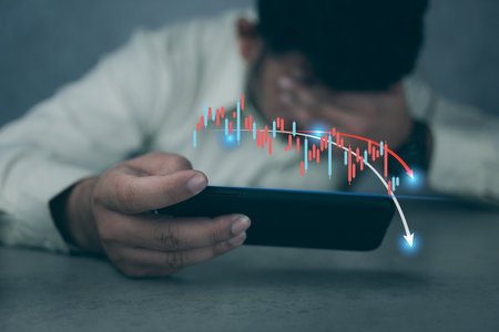 Stressed businessmen after checking stock market data, chart data fall down loss, desperate about...