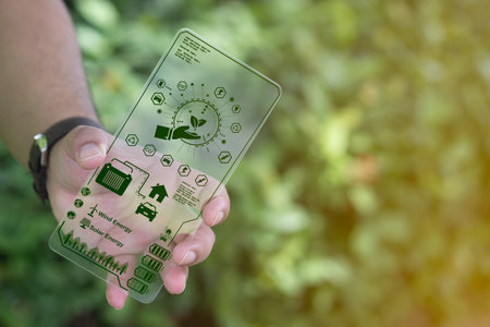 The concept of renewable energy and energy efficiency. A man show icon renewable energy for home, car and etc. Save world, sustainable environment concept.の写真素材