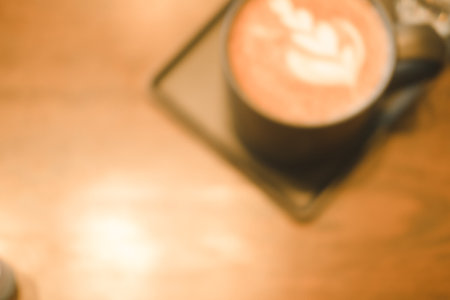 Blur background of hot coffee in black ceramic glass. Close upの写真素材
