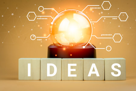 Light bulb with a diagram on wood block with word IDEAS, new idea concept with innovation and inspiration, innovative. Great idea conceptの写真素材