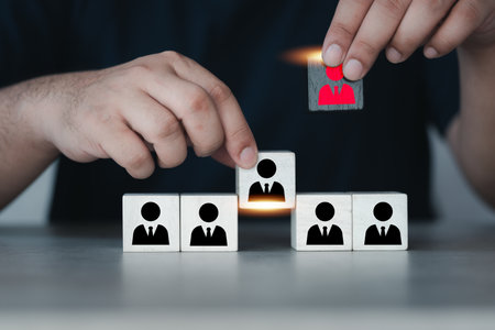 Man hand pulling toxic employees from the crowd block and change new employees. Human resource management, Teamwork, toxic people and leadership concepts. HR conceptの写真素材