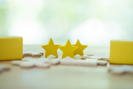 Wood block three star shape on wooden table with nature background. 3 stars rated best service excellence concept. Excellence customer voter quality satisfaction winners award.の写真素材