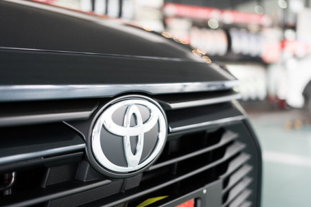 Bangkok, Thailand - February 25, 2023 :  Close up of Toyota logo on all new Toyota YARIS ATIV front view. Urban Metal color.のeditorial素材