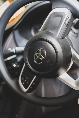 Bangkok, Thailand - March 7, 2023 : Close up steering wheel of car Toyota YARIS ATIV, car interior...