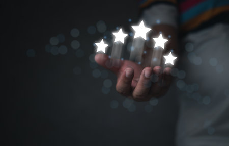 Customer evaluation feedback concept. Client giving positive review for satisfaction surveys. Giving a five star rating. Service rating, the best satisfaction conceptの写真素材