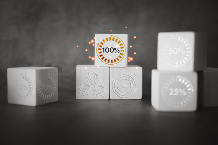 The concept of the project completion to 100 percent success to work. Wood block with icon 100...