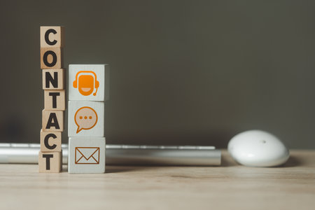 Wood block symbol call center, chat and mail address. Website page contact us or e-mail marketing concept. Hotline support contact communication concept. Wood block text of CONTACT and hotline iconsの写真素材