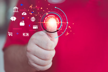 Cyber security, Internet security online. Man touching fingerprint identification to access personal financial data, on a digital network, Technology cybernetic of futuristic on networking.の写真素材