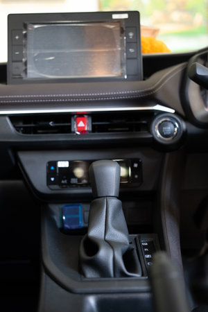 Bangkok, Thailand - April 15, 2023 : Close up gear stick interior inside bright car. A car of Toyota...