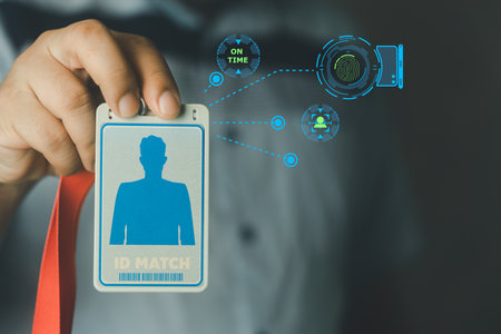 Staff showing ID staff card on scanning access system for identity verification to attendance to work, fingerprint and face for check attendance. Employee attendance concept. HR conceptの写真素材