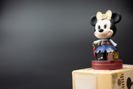 Samut Prakan, Thailand - May 5, 2023 : Minnie Mouse from Blind Box Disney Mickey And Friends Steampunk 10 cm. on a black background.のeditorial素材