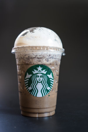Bangkok, Thailand - May 9 : Glass of Starbucks Coffee frappuccino blended beverages on a black background. The coffee famous brand with worldwide shop and store in cities around the worldのeditorial素材
