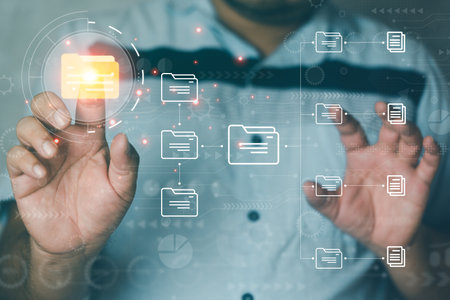 Document management system concept, businessman open folder and document icon software, searching and managing files online document database, for efficient archiving and company data.の写真素材