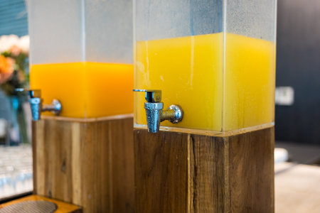 Row of fresh juice buffet self service at the hotel. Close upの写真素材